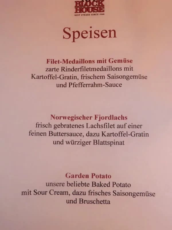 Speisekarte mit drei Tellergerichten